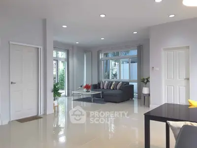 Spacious modern living room with elegant decor and natural light