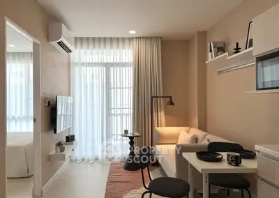Modern living room with cozy seating and natural light