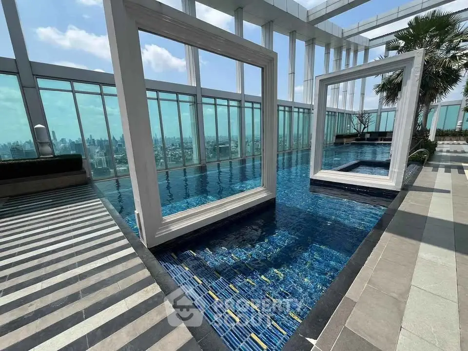 Stunning rooftop pool with panoramic city views and modern architectural design.