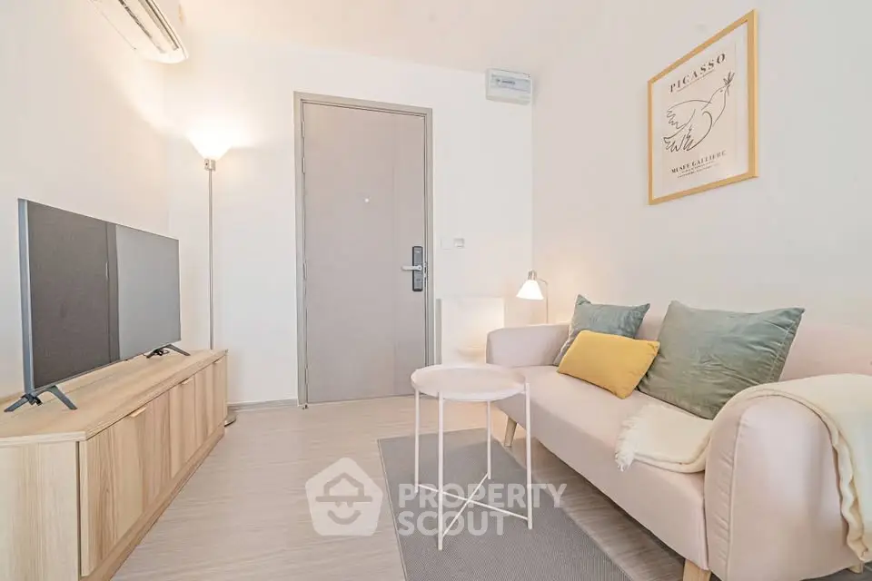 Cozy modern living room with stylish decor and comfortable seating, perfect for relaxation and entertainment.