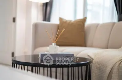 Stylish living room with modern decor and cozy seating area.