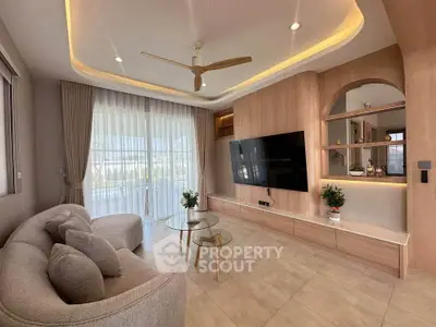 Modern living room with elegant decor, large windows, and stylish furniture, perfect for relaxation and entertainment.