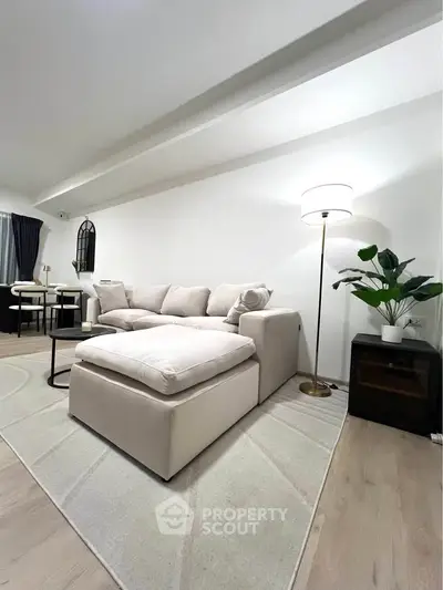 Spacious modern living room with elegant decor and cozy seating area