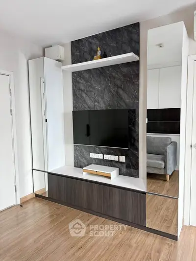 Modern living room with sleek TV unit and stylish decor
