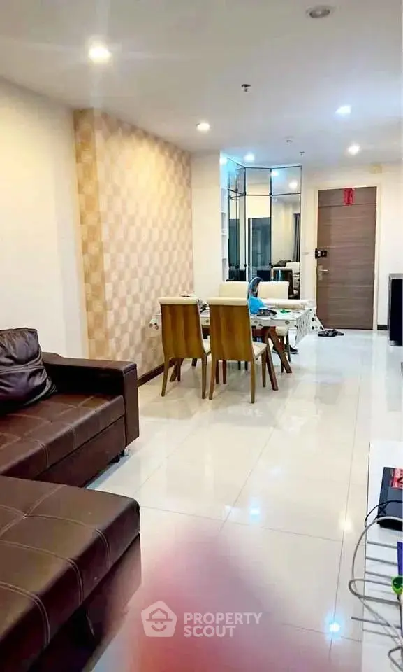 Spacious modern living room with elegant dining area and stylish decor