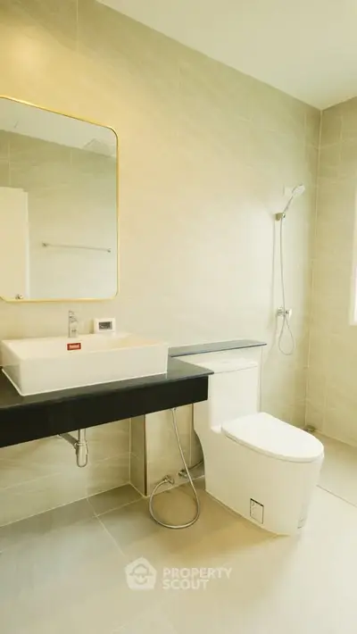 Modern bathroom with sleek fixtures and elegant tile design