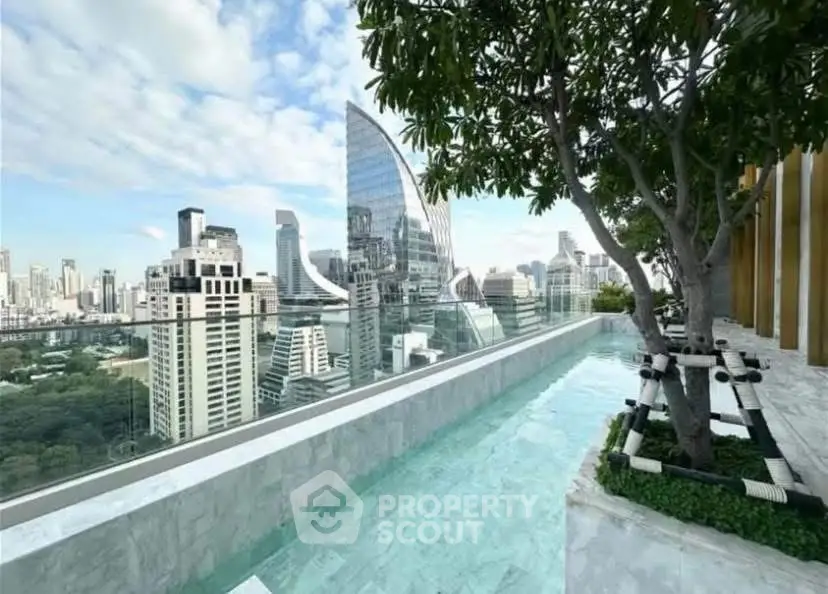 Stunning rooftop pool with breathtaking city skyline view