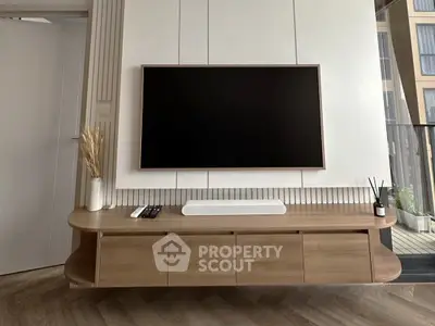 Modern living room with sleek TV unit and stylish decor