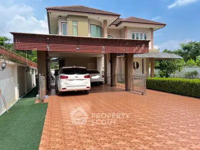 Spacious two-story house with large driveway and covered parking in a serene neighborhood.