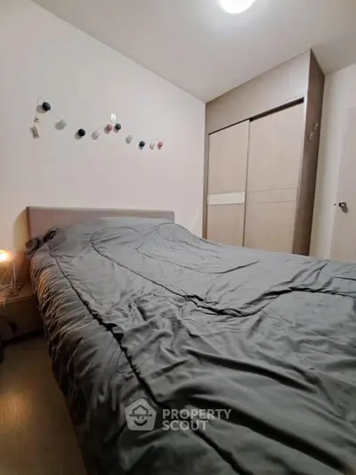 Cozy bedroom with modern decor and ample closet space