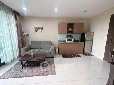 Modern living room with open kitchen and stylish decor