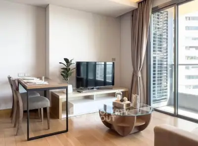 Modern living room with balcony access and stylish furniture