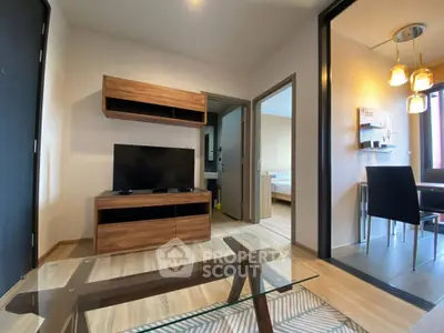Modern living room with stylish furniture and open dining area
