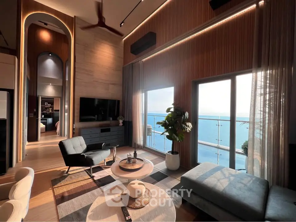 Luxurious living room with stunning ocean view and modern decor