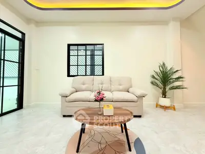 Modern living room with cozy sofa and stylish coffee table