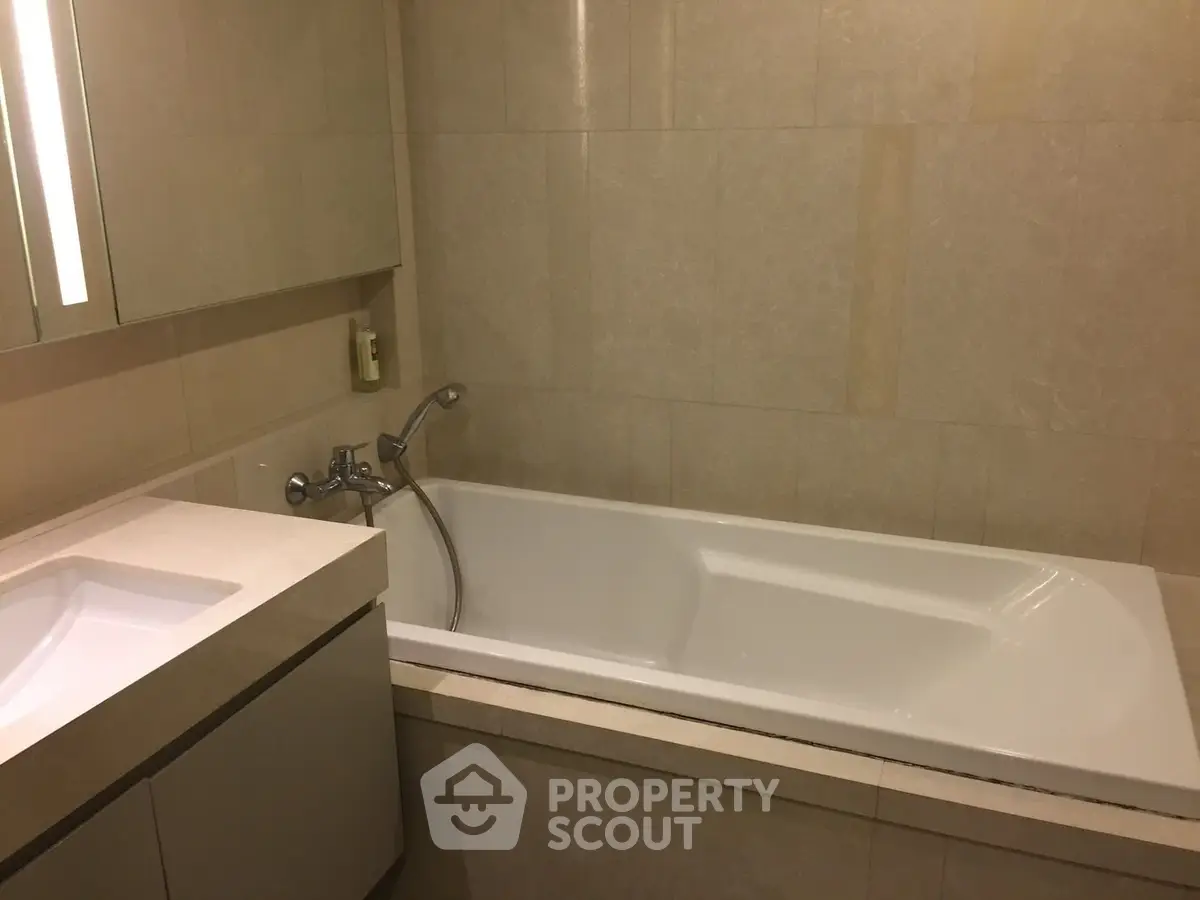 Luxurious bathroom with elegant bathtub and modern fixtures