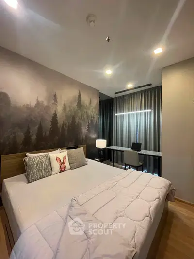 Modern bedroom with forest-themed accent wall and workspace