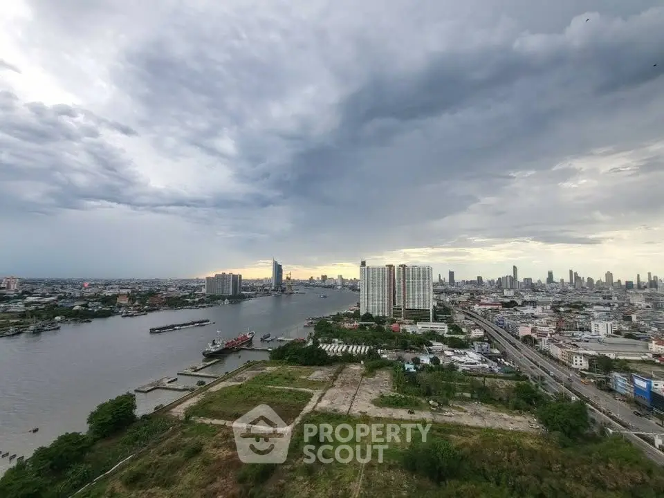 Stunning cityscape view with river and skyline, perfect for urban living enthusiasts.
