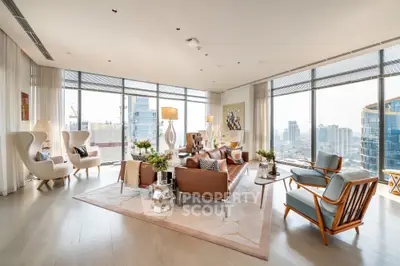 Luxurious modern living room with panoramic city views and elegant furnishings.