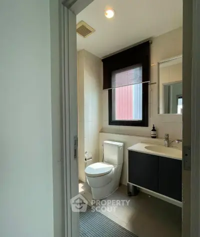 Modern bathroom with sleek fixtures and natural light