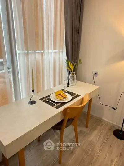 Cozy study nook with natural light and elegant decor, perfect for productivity and relaxation.