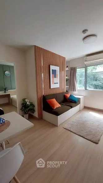 Cozy living room with modern decor and natural light