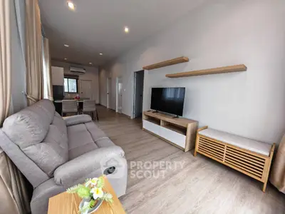 Spacious modern living room with stylish furniture and natural light