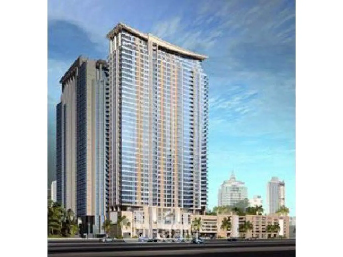 Stunning high-rise building with modern architecture in a vibrant urban setting.