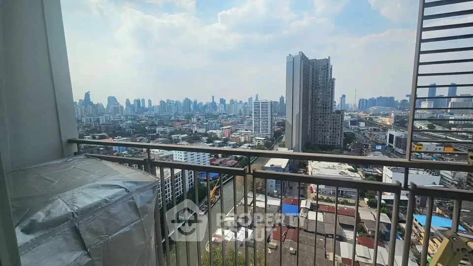 Stunning cityscape view from high-rise balcony with urban skyline