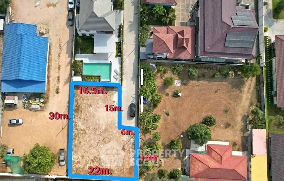 Aerial view of a real estate plot with dimensions marked, ideal for development.