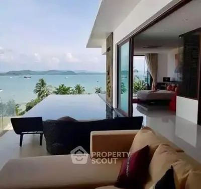 Luxurious beachfront villa with stunning ocean view and infinity pool