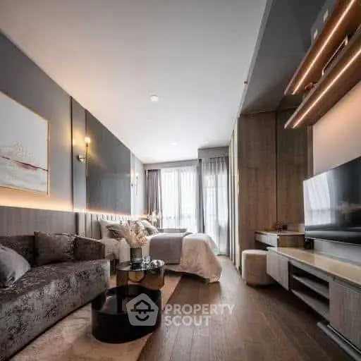 Luxurious modern living room with elegant decor and ample natural light.