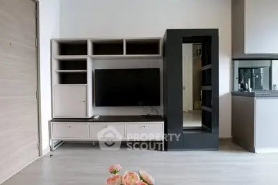 Modern living room with sleek TV unit and minimalist decor