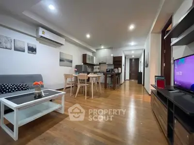 Spacious modern living room with open kitchen and stylish decor