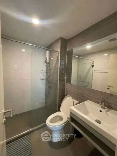 Modern bathroom with sleek fixtures and contemporary design.