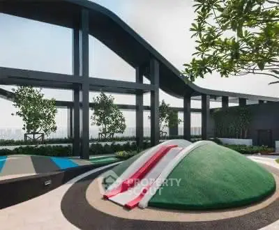 Modern rooftop playground with slides and greenery in urban building.
