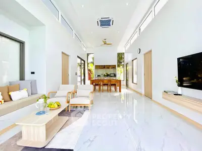 Spacious modern living room with high ceilings and elegant decor