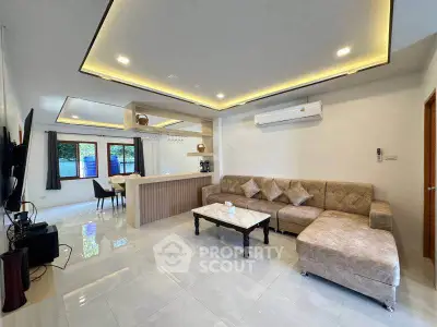Modern living room with open layout and stylish furniture