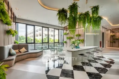 Modern living room with stylish decor and lush greenery, featuring a spacious open layout and elegant furnishings.