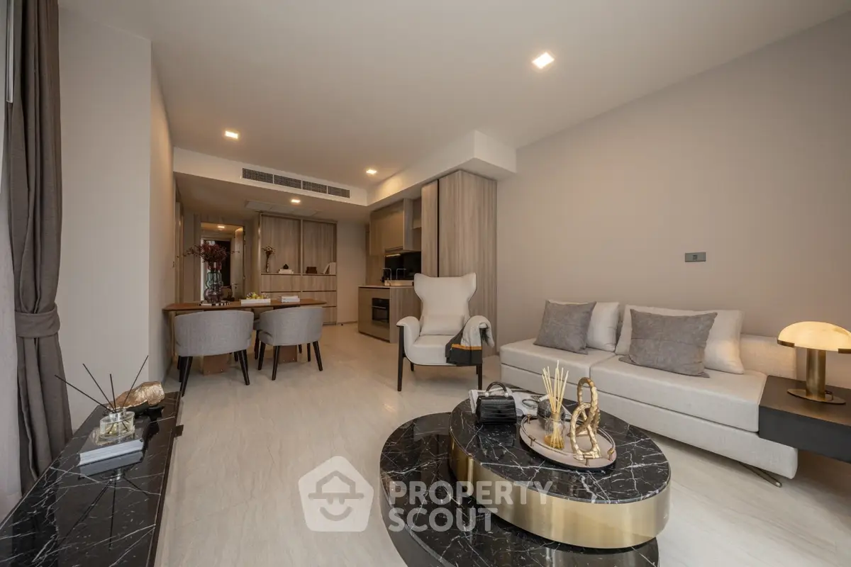 Luxurious modern living room with elegant decor and open kitchen layout