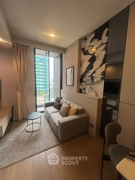 Modern living room with stylish decor and large window view