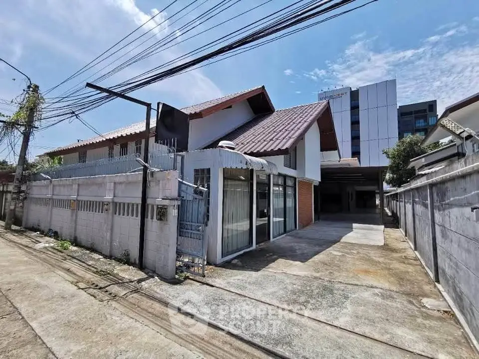 Charming suburban house with spacious driveway and modern architecture