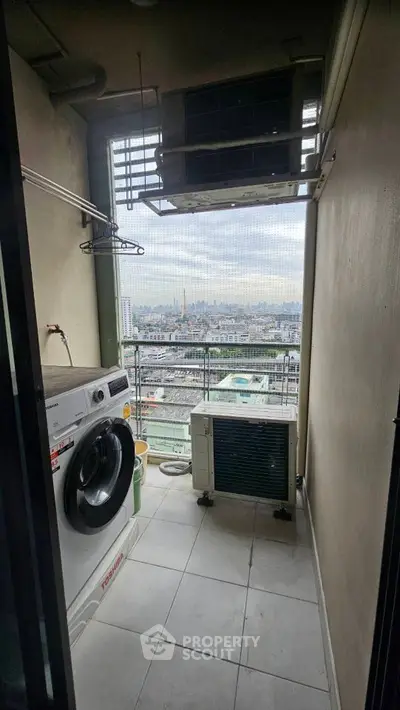 High-rise balcony with laundry area and stunning city view
