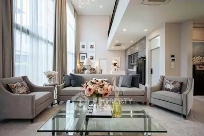 Luxurious modern living room with high ceilings and elegant decor