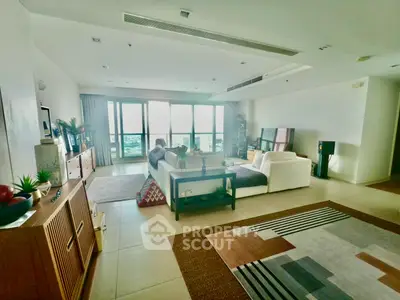 Spacious modern living room with panoramic windows and stylish decor