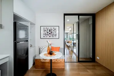 Modern living room with stylish decor and wooden flooring