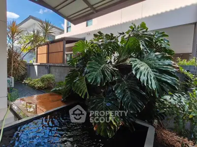 Stunning garden view with lush greenery and modern architecture, perfect for tranquil living.
