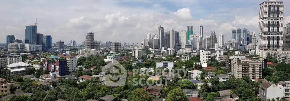 Stunning cityscape view showcasing a vibrant urban skyline with lush greenery and diverse architecture.