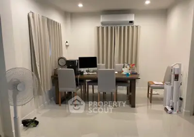 Modern study room with sleek furniture and air conditioning, perfect for productivity and comfort.