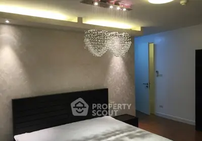 Elegant bedroom with modern lighting and stylish decor